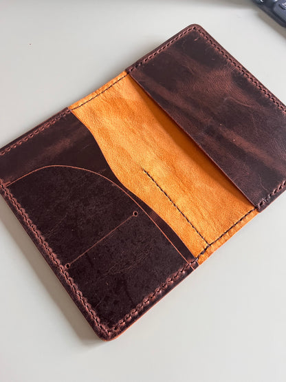 Pocket size with an inside leather